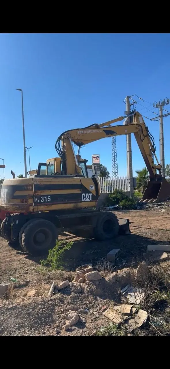 Pelle hydraulique sur pneus CAT M315 – Location à louer à Casablanca
